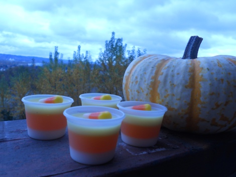 Candy Corn Jello Shots in one ounce disposable shot glasses